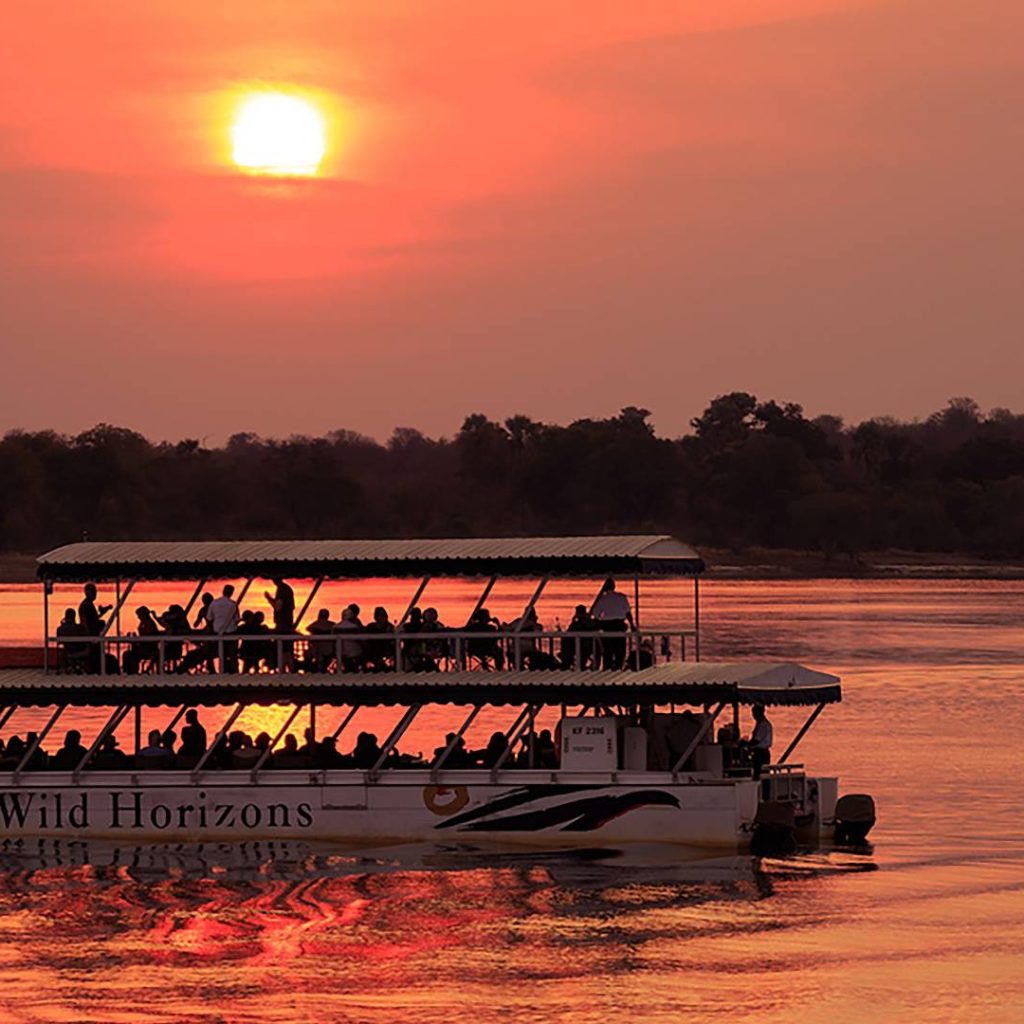 Luxury sunset cruise boat on Zambezi River near Victoria Falls, Zambia