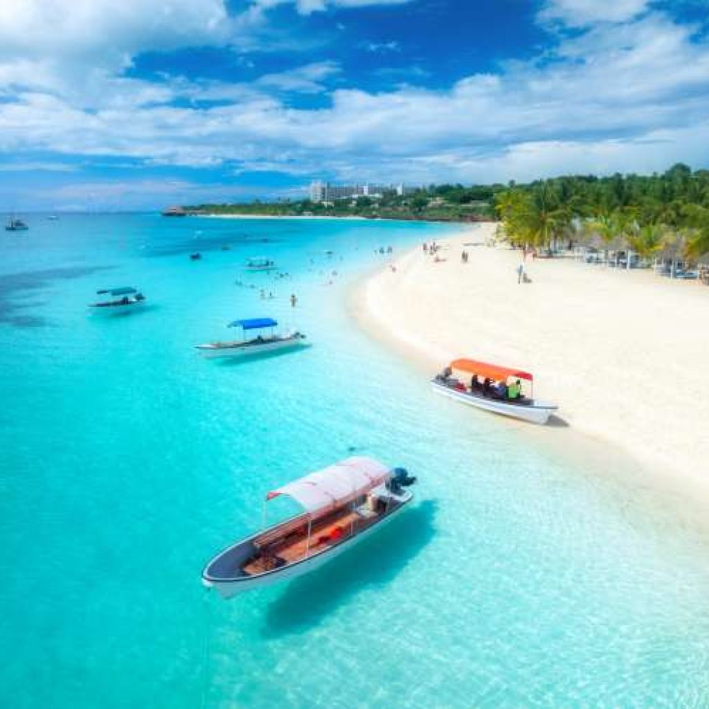 Zanzibar white sand beach with turquoise Indian Ocean waters, Tanzania